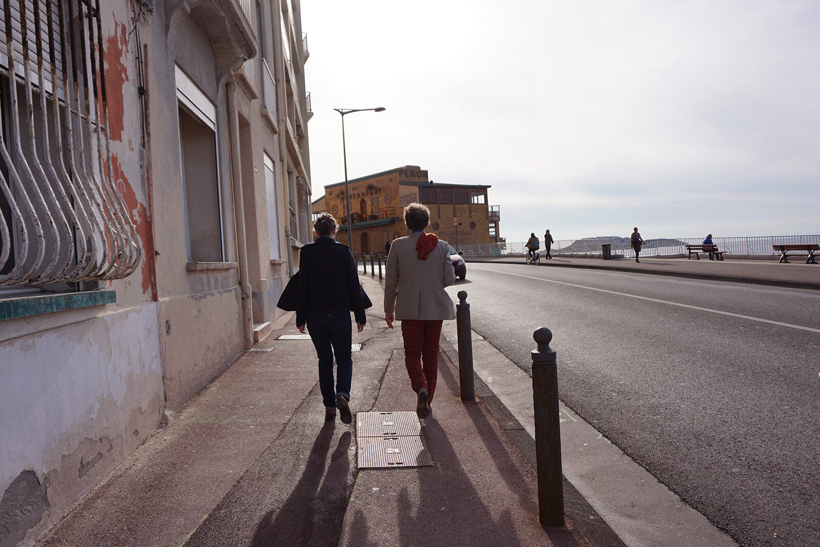 Catherine and Vincent stroll along the Corniche.