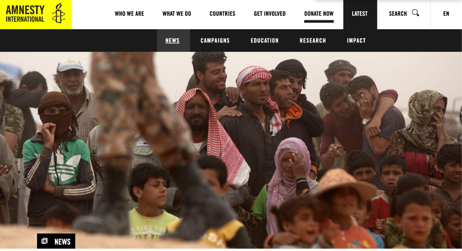 Syrian refugees at the Jordan-Syria border await transport to Za'atari refugee camp (Photo Amnesty.org)