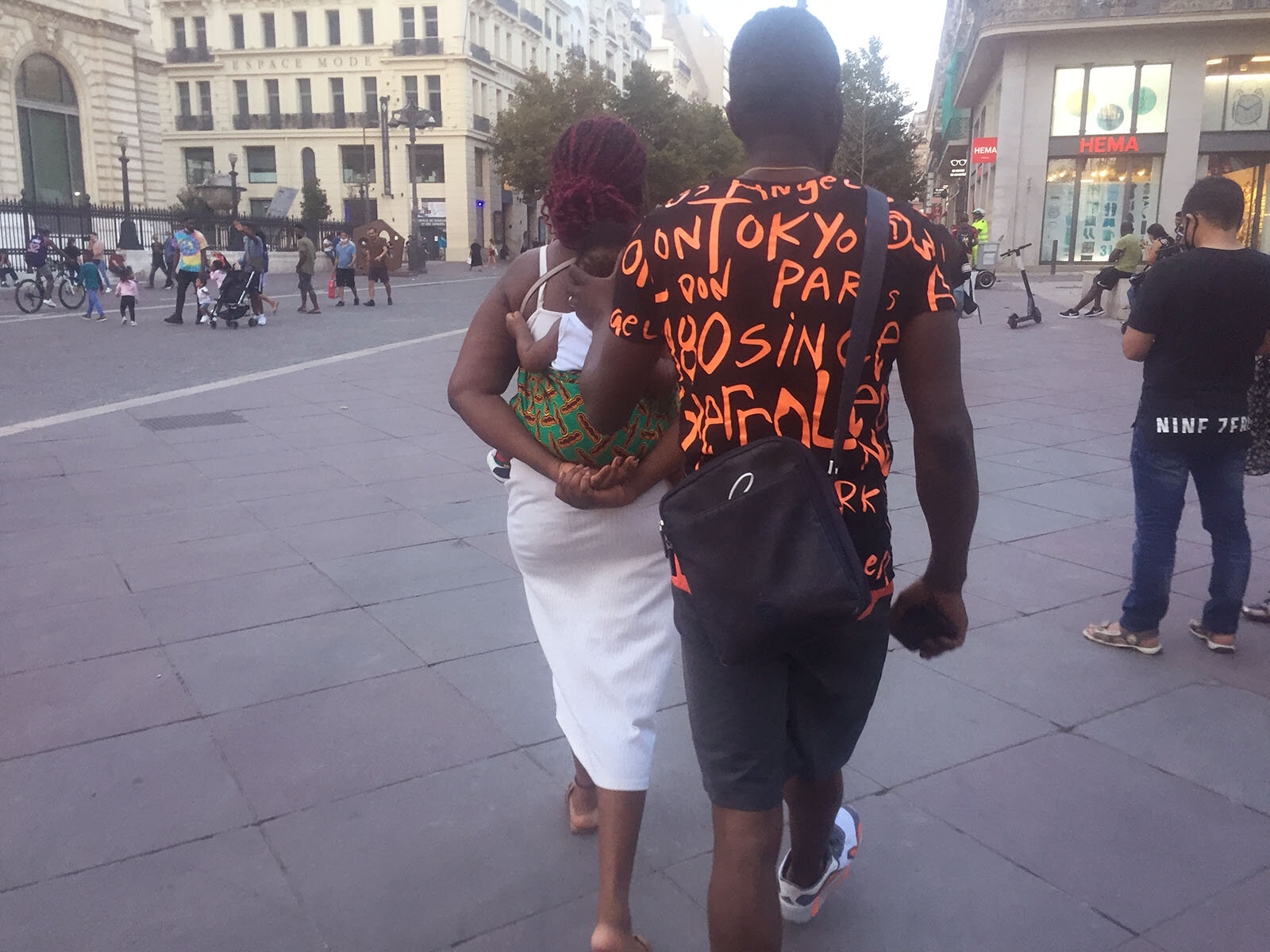 Couple on a date walking down La Canebière.