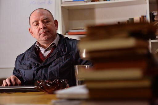 Lokman Slim at his desk (photo Marwan Tahtah).
