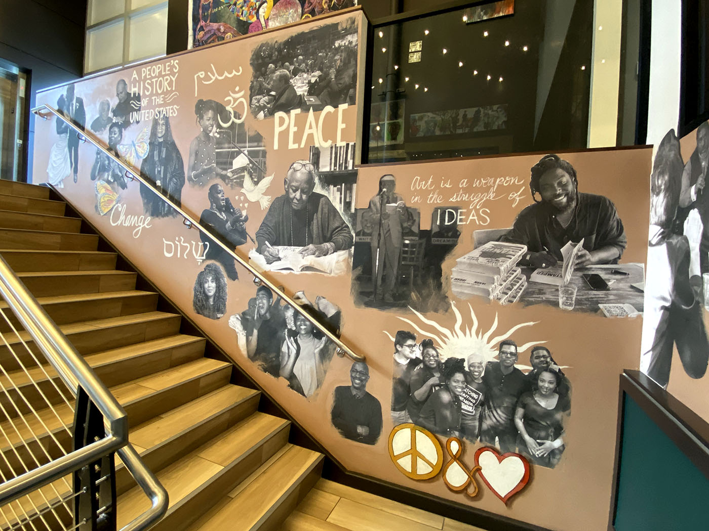 A Busboys and Poets mural featuring Howard Zinn's A People's History of the United States.