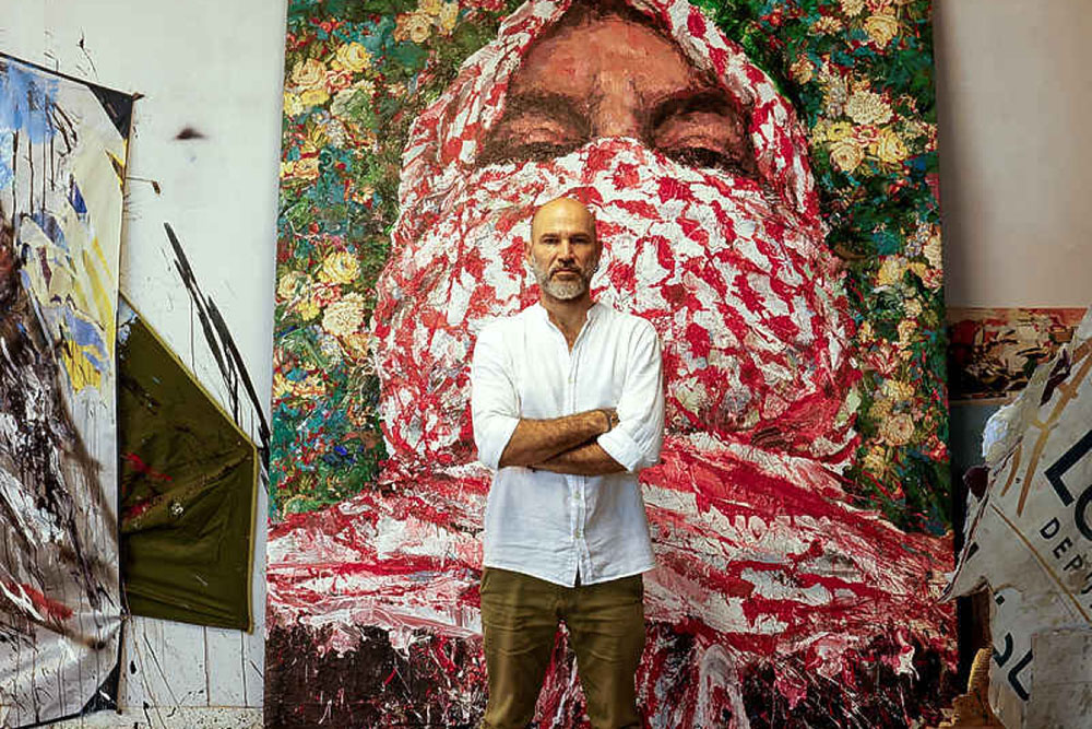 Ayman Baalbaki in his studio with a version of Al Moulatham