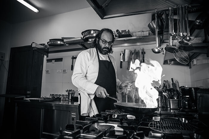 Chef Fadi Kattan working away in his kitchen at Fawda, in Bethlehem.