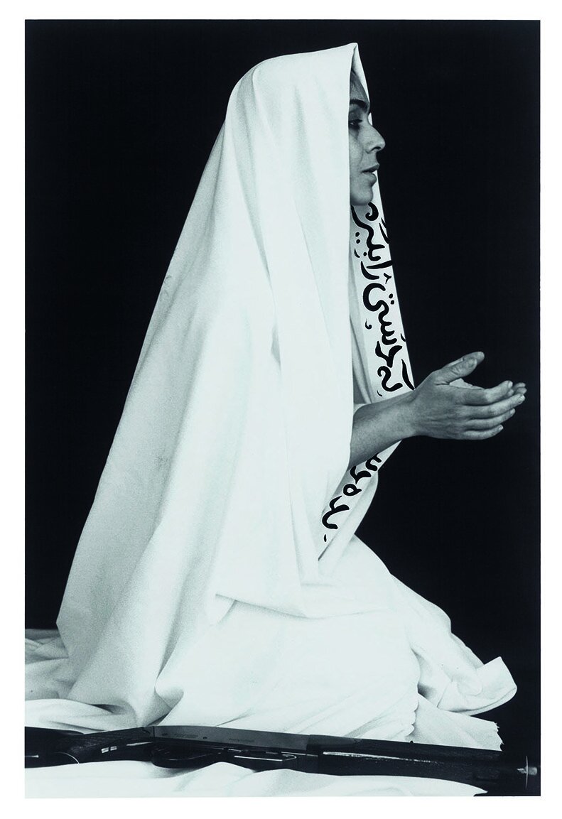 Shirin Neshat, From the Women of Allah series, 1995. Gelatin silver print with handwritten calligraphy in ink. Reproduced by permission of the artist.