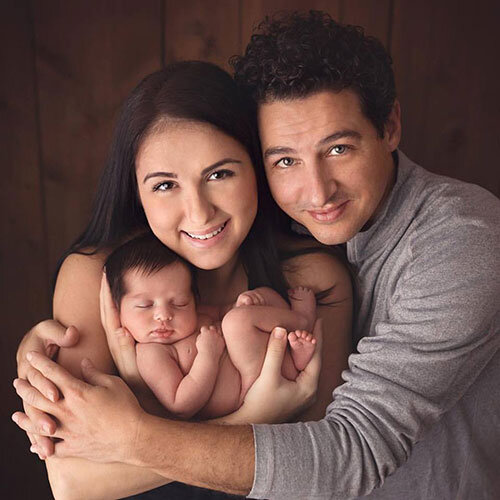Comedian Aron Kader and his wife Nada with their first-born.