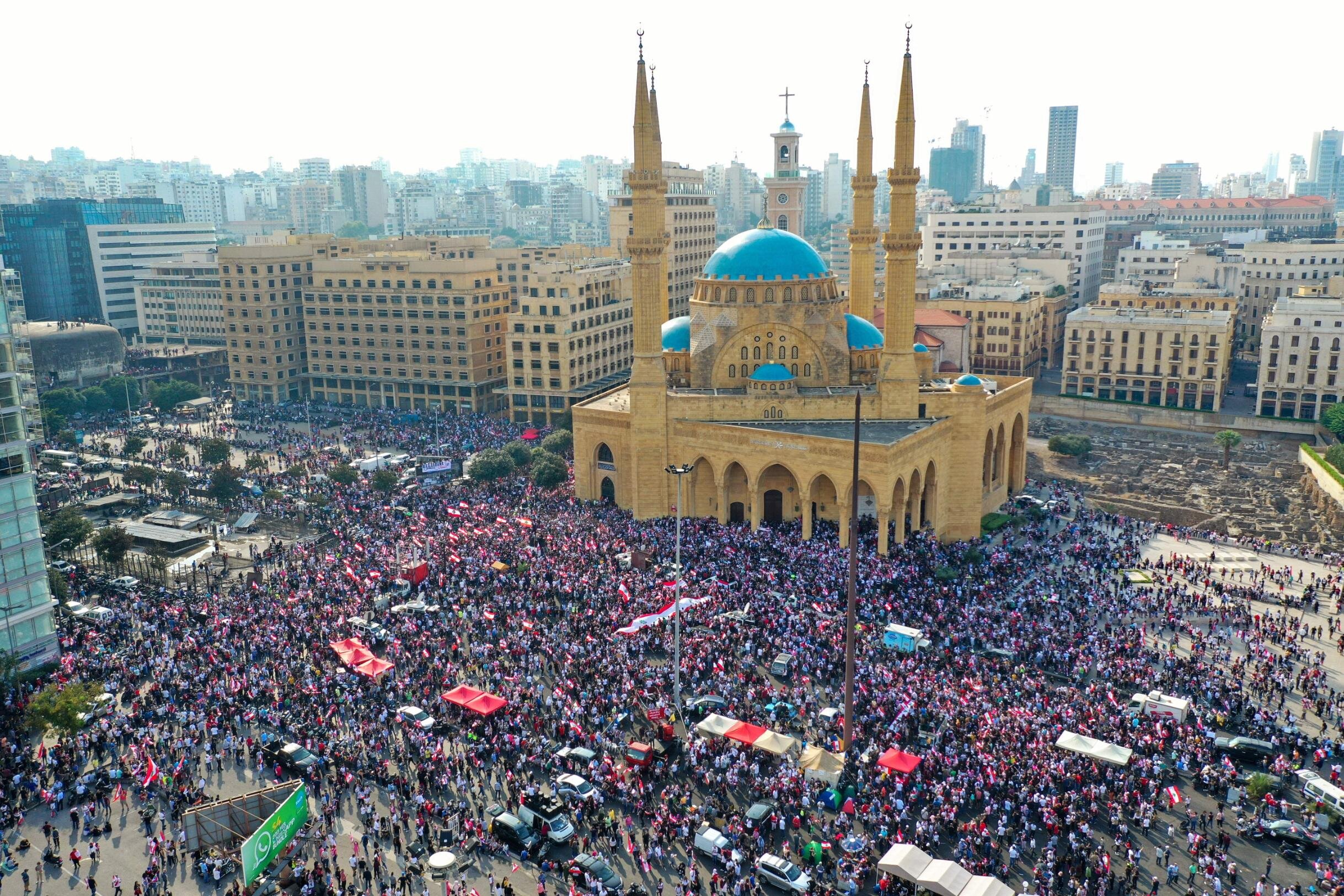 Lebanese protesters rally in central Beirut during demonstrations against tax increases and official corruption.