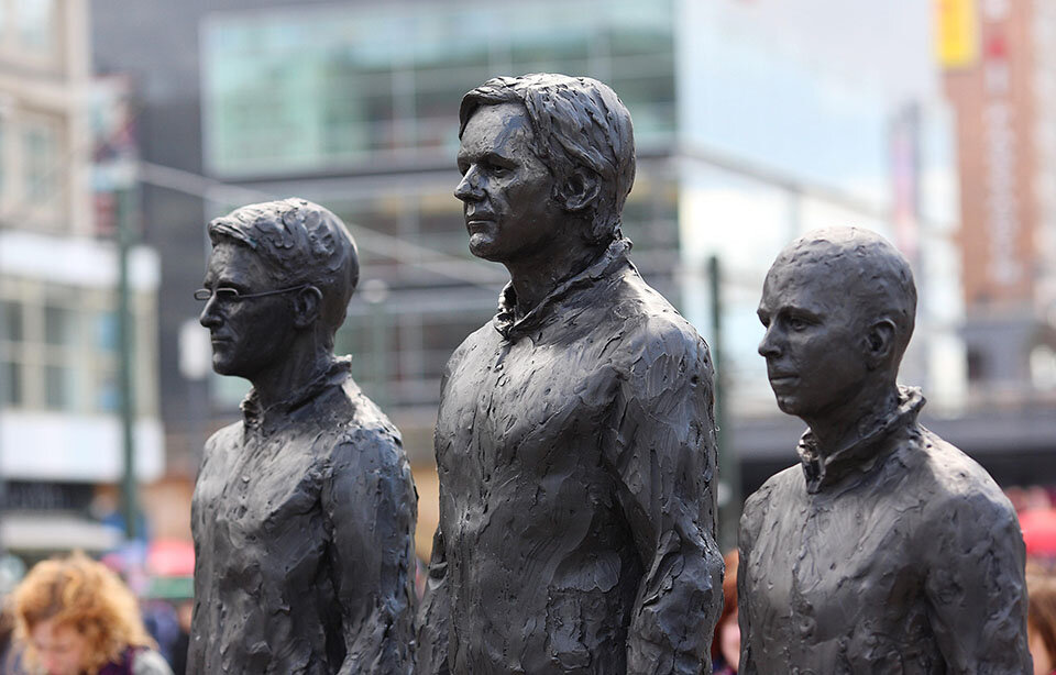 Edward Snowden, Julian Assange &amp; Chelsea Manning statues by Italian sculptor David Dormino, Alexanderplatz - Berlin 2015.