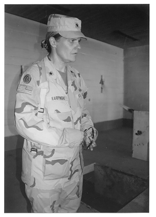 Brigadier General Janis Karpinski guides journalists through Abu Ghraib, standing by the hanging platform in the old ‘death chamber' (photo Hadani Ditmars, from her book   Dancing in the No-Fly Zone  ).