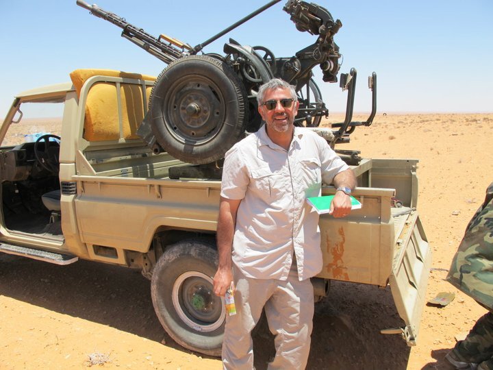 Reporter Borzou Daragahi covering conflict in Libya in 2011