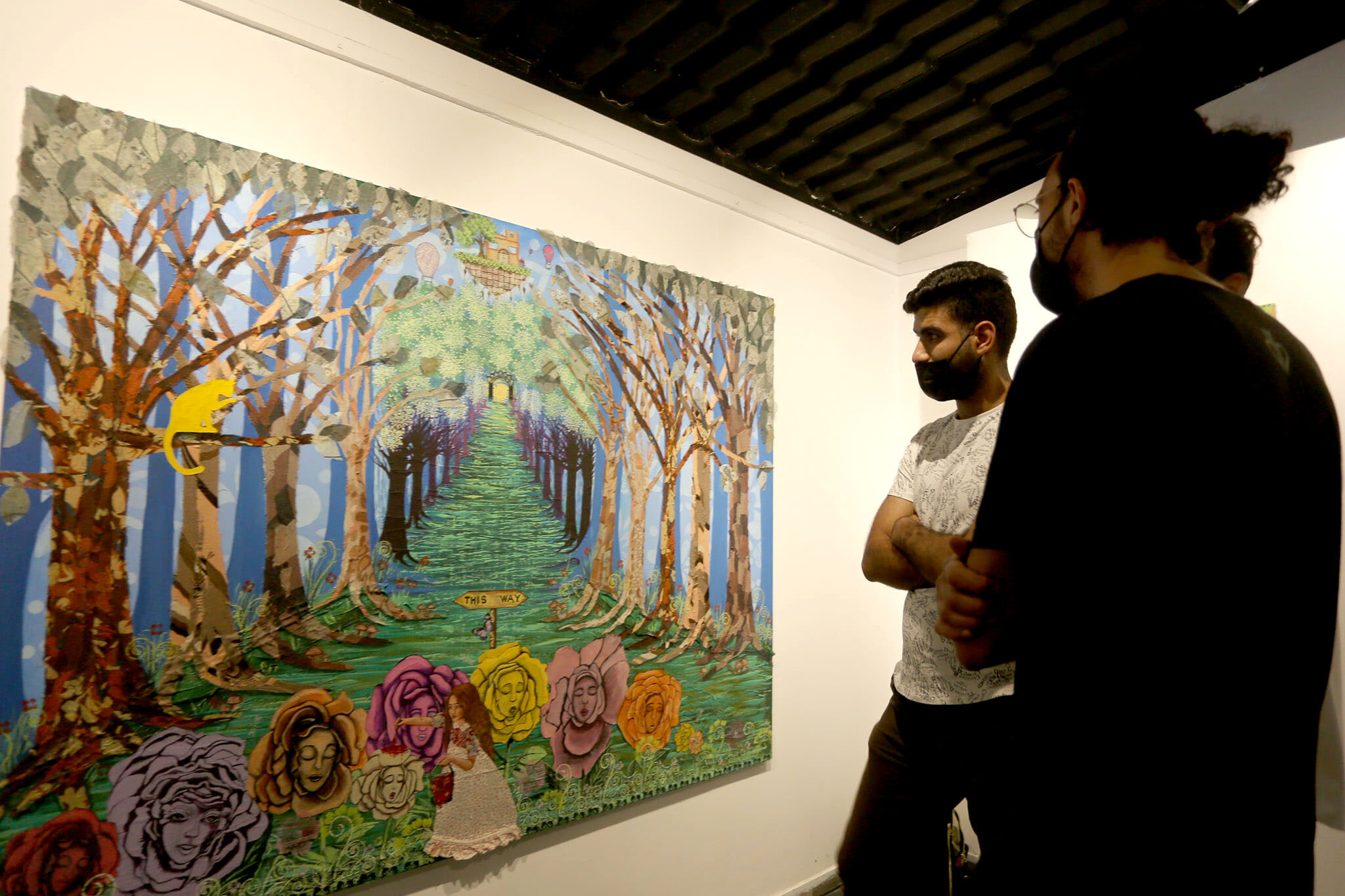 Visitors to the Shababek Gallery view 