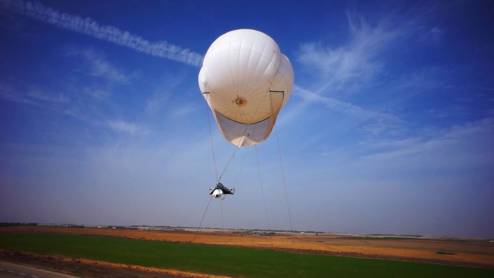 An Israel-made  SkyStar-180  surveillance balloon keeps an eye on Palestinians.