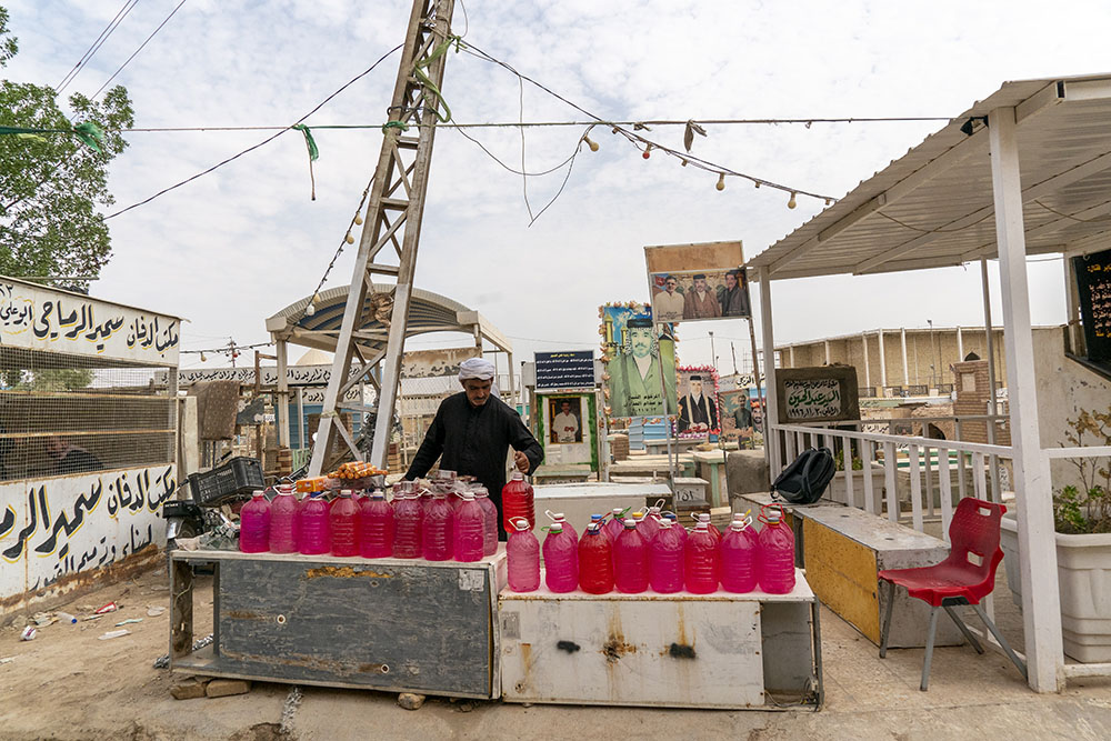 Ali Sahib HusseiAli Sahib Hussein selling holy water and incense at the world’s largest cemetery in Najaf, Iraq. 