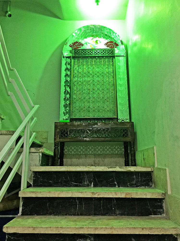 7. A reminder, in a staircase of an office building- a religious shrine. Later the window will be covered by cloths with the names of the Prophet and his family inscribed upon them