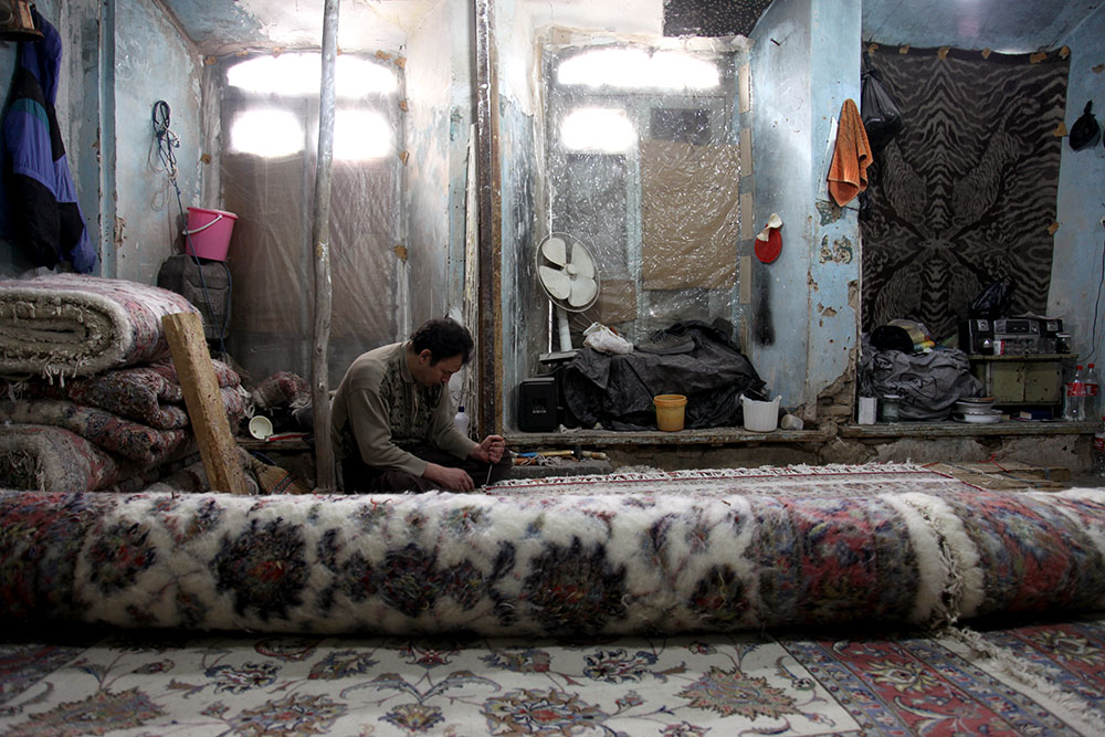 Inside the carpet mender’s, Mashhad.