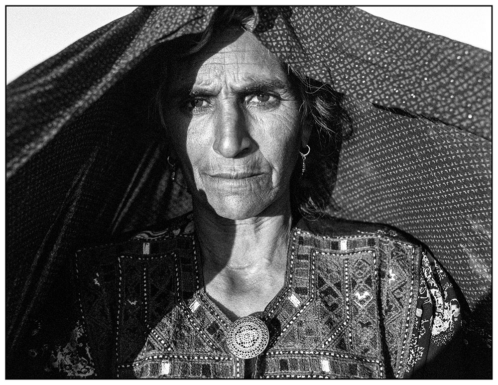 Nomadic matriarch living by the the dry Lake Hamoun.