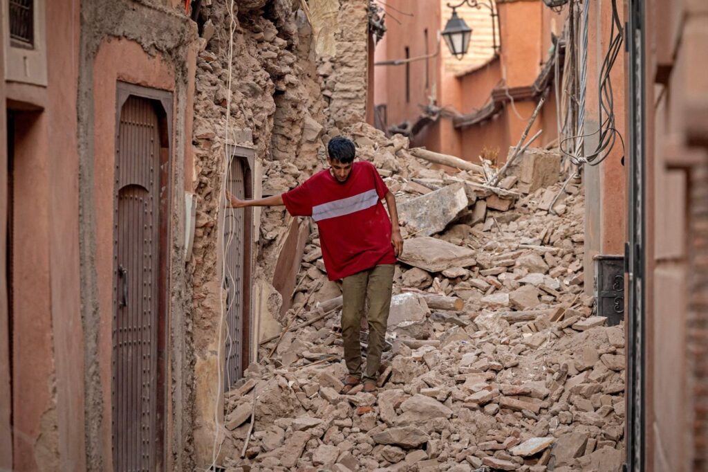 A resident navigates through the rubble Saturday in Marrakech. Fadel Senna : AFP - Getty Images