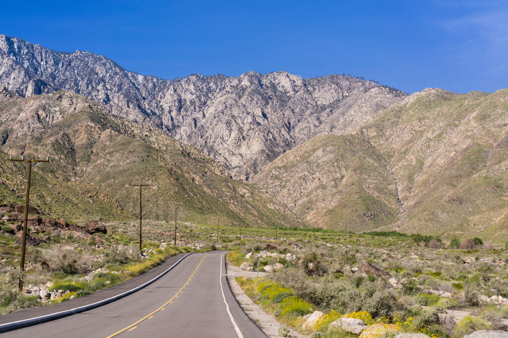 The highway leading to a Southern California desert town photo Andrei Stanescu