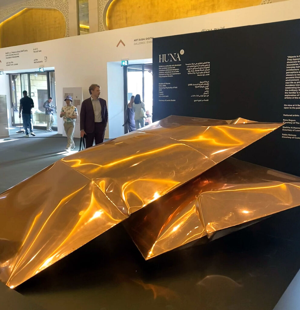 Shaika Al Mazrou foyer of Art Dubai 2024. Shaikha Al Mazrou, Measuring Physicality of Void, 2022, copper, 7 works, 3.6 x 2.4M each photo Sophie Kazan M