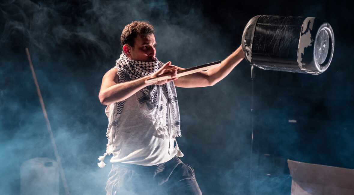 Ahmed Tobasi performing in And_Here_I_Am courtesy Freedom_Theatre