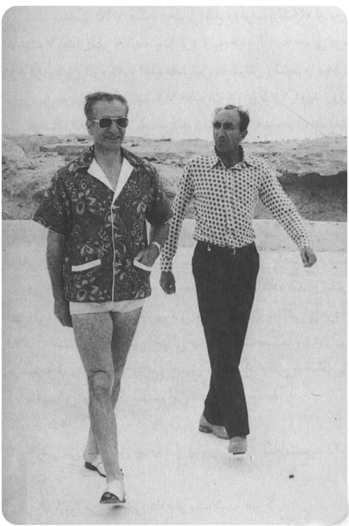 HIM Shah Mohammad Reza Pahlavi and Asadollah Alam walking on the beach circa 1966 (courtesy Ibex Publishers).