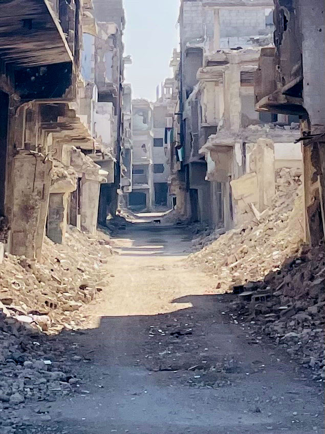 Palestinian flags flying in the devastated Yarmouk camp, Damascus. Yarmouk, the largest Palestinian camp in Syria, was subjected to a starvation siege and bombardment by the Assad regime. Photo taken 13-01-25 photo dan gorman