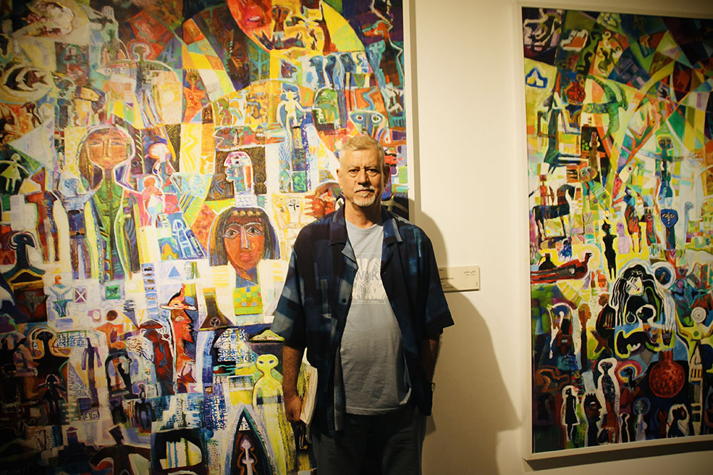 Maki Omran’s surreal collages of what he names Overlapping Worlds that blend images of extra-terrestrials, ancient sites, American war planes, Donald Trump with a tattered Iraq flag on his arm and grieving Sumeriam goddesses, that reads like an iphone scroll through history and yet somehow manages to capture Iraqi reality.