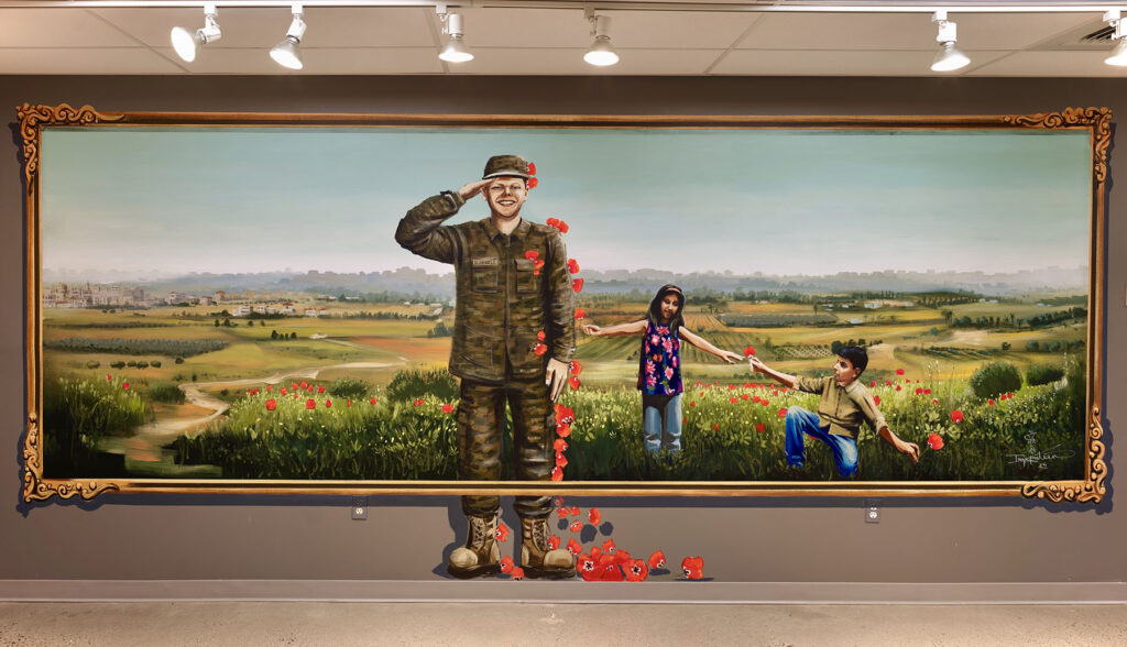 The new Aaron Bushnell Mural, painted by Bethlehem artist Taqi Spateen at the Palestine Museum, in Woodbridge Connecticut (courtesy Palestine Museum).