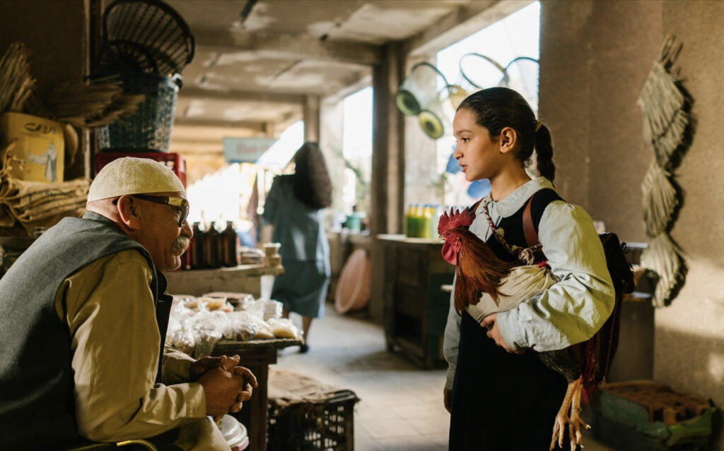 Baneen Ahmad Nayyef as Lamia in The President's Cake