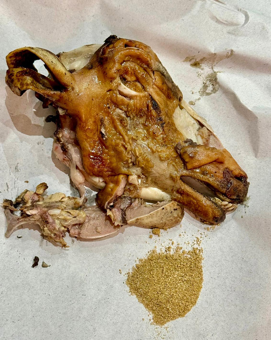 half a roasted head at a méchoui vendor in the medina of Marrakesh with cumin salt photo courtesy Anissa Helou