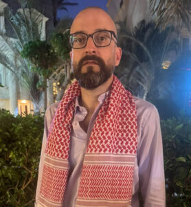 Bassem Khandaqji, 41, poses for a photo at a hotel in Cairo on Oct. 17, 2025, days after Israel freed him and other Palestinian prisoners in the Gaza ceasefire deal. He was imprisoned for helping plan a deadly 2004 bombing in Tel Aviv, and went on to become an award-winning novelist in prison.Ahmed Abuhamda/NPR